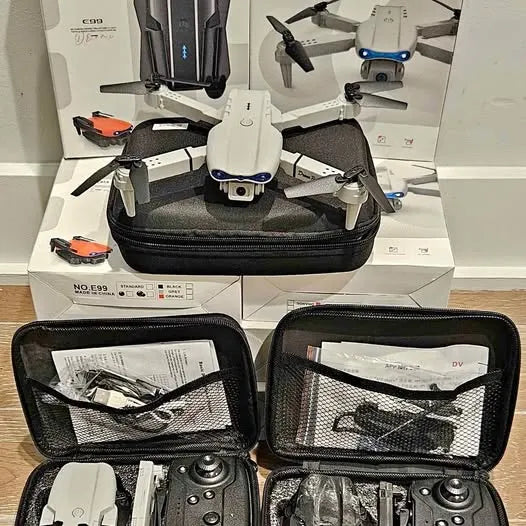 Foldable quadcopter drone with blue lights and zip storage case for accessories