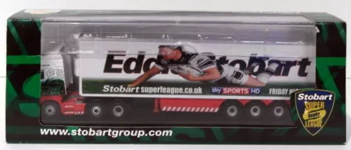 Diecast truck model in clear display box with Stobart-style livery and green accents