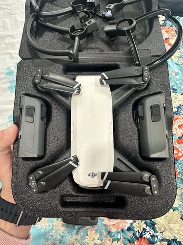 DJI Spark drone with controller in black foam carrying case