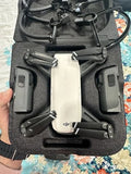 DJI Spark drone with controller in black foam carrying case