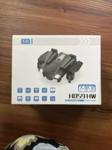 Foldable mini drone box with printed drone image and 1080P HD camera label