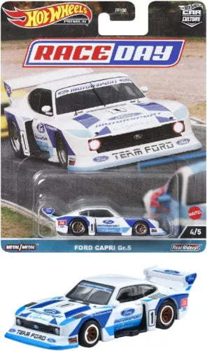 Diecast race car model, white and blue Ford Capri Gr.5 with #1