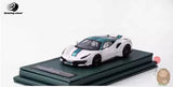 Ferrari 488 Pista 1/64 resin model car in white and teal, on display base