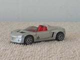 Silver diecast convertible car with red interior, front 3/4 view, number 6