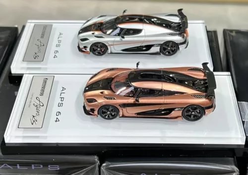 Diecast toy sports car set, white and bronze with black trim