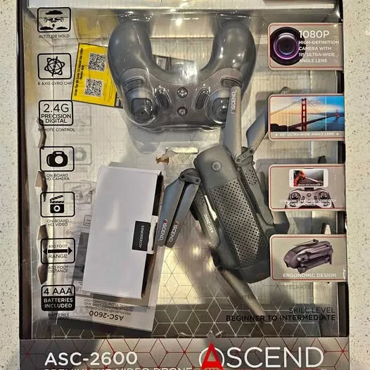 ASCEND drone in retail packaging, quadcopter body and controller accessories