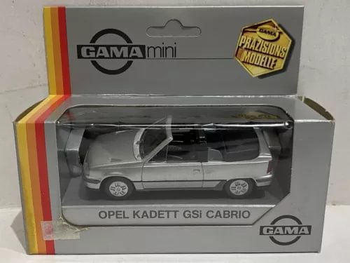 Silver diecast car model of Opel Kadett GSi Cabrio, 1:43, in display box