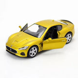 1/36 scale Maserati GranTurismo MC diecast model car in gold with detailed wheels