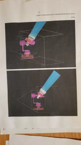 Printed drone gimbal diagram on dark paper with blue and purple component illustration