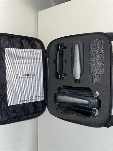 Black drone carry case with mesh pocket and folded drone parts