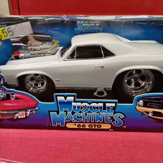 White 1966 GTO diecast muscle car model, chrome wheels