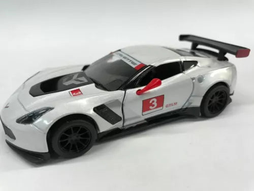 Diecast sports car model in silver with black hood and red accents, rear wing up