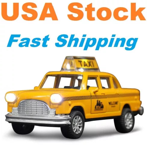 Yellow city taxi diecast model car with clear rooftop light and TAXI sign