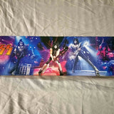 Diecast toy box with colorful rock band artwork and stage lights