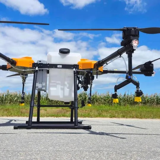 Drone fumigating sprayer with 30L tank, orange frame and multi-rotor arms