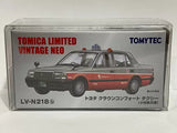 Toy car model in clear box, red and black sedan with roof sign and taxi decals