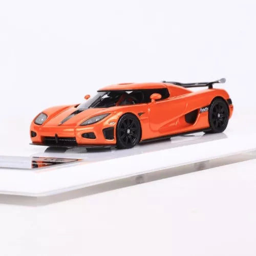 Orange racing sports car model diecast resin, front 3/4 view with black wheels