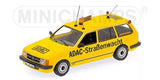 Yellow diecast model of an Opel Kadett D station wagon car, front three-quarter view