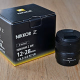 Nikon NIKKOR Z DX 12-28mm lens with black mount and rear cap