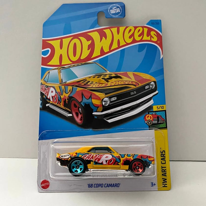 Yellow 1968 Copo Camaro Hot Wheels diecast car in retail blister card, front view