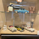 Diecast classic car set in glass display case with blue, cream, and white cars