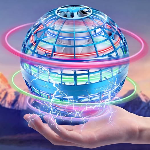Flying hover orb ball toy with colorful LED ring lights, held in hand