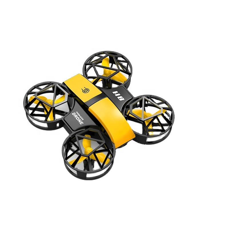 Yellow and black mini quadcopter drone with four propeller guards and LED lights