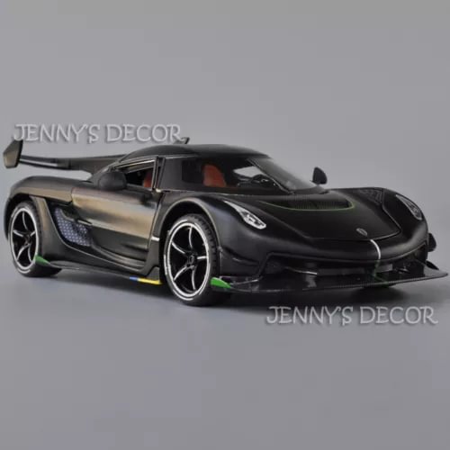 Black Koenigsegg Jesko diecast model car with green accents and pull-back action