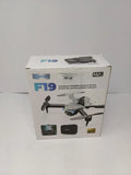 Toy quadcopter drone retail box with F19 label and camera graphics