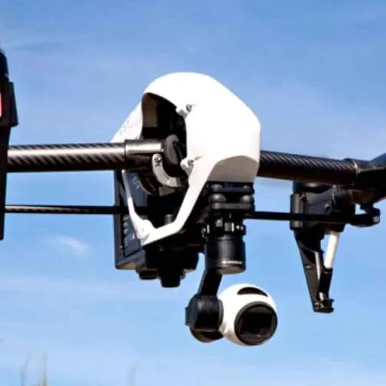White drone with dual cameras and four rotors