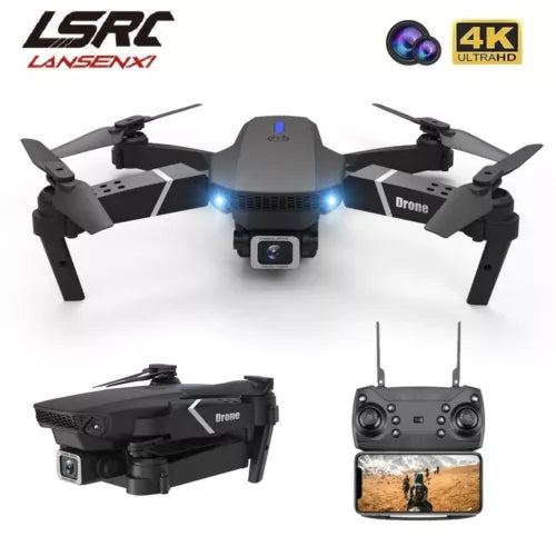 Black quadcopter drone with front camera, landing lights, and four propellers; controller
