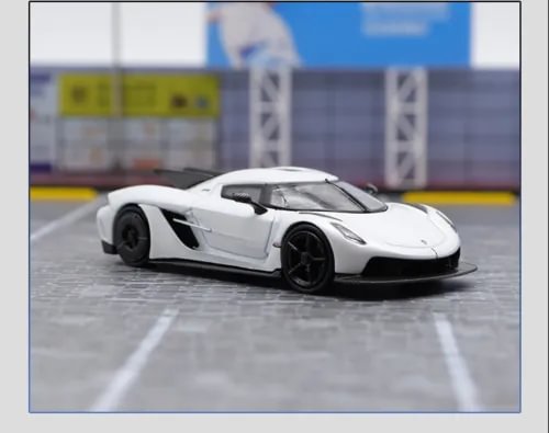 White diecast supercar model with black wheels, front 3/4 view