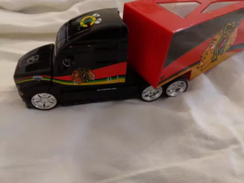 Maisto All Stars diecast semi truck, black cab, red trailer with team logo, 1/64