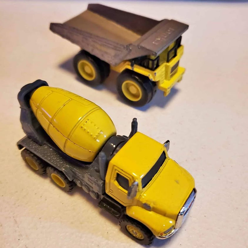 Yellow diecast construction trucks, lot of 2 with dump beds