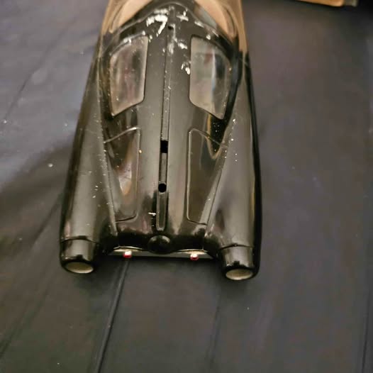 Diecast Batmobile model car, front view with windshield and twin headlights