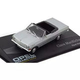 Gray Opel Rekord A diecast model car with open top, on display base.