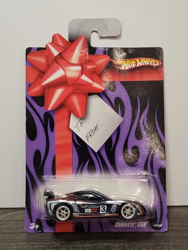 Hot Wheels Corvette C6R diecast toy car in blister pack, silver with dark blue accents