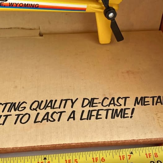 Die-cast helicopter toy box with 'LAST A LIFETIME' text