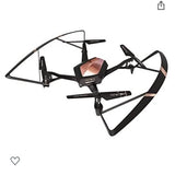 Black quadcopter drone with pink center housing and four propellers