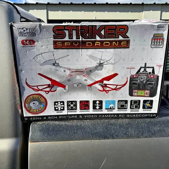 Spy drone retail box with printed drone illustration and control panel graphics