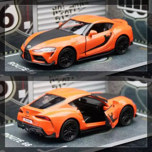 1/36 scale orange diecast sports car model, front 3/4, black wheels