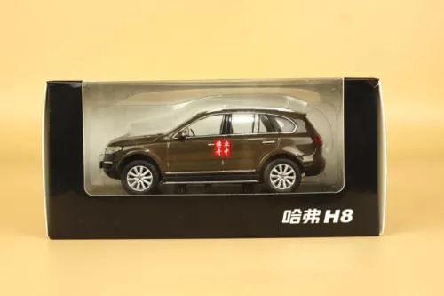 Diecast SUV model in retail box, dark brown with silver wheels