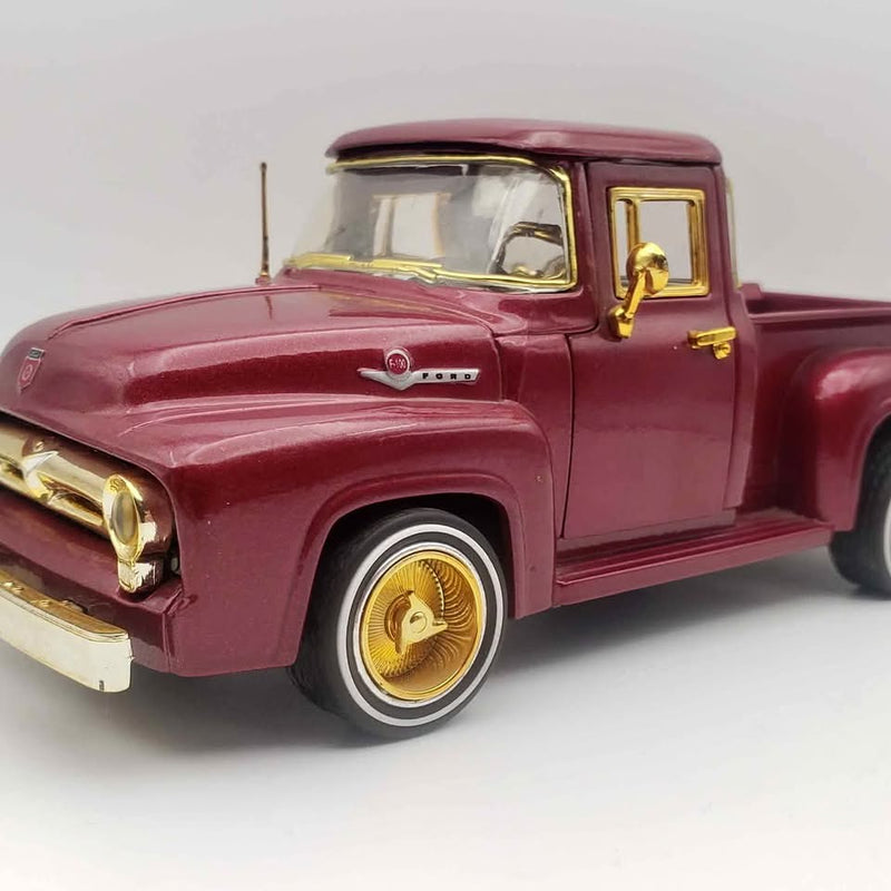 Maroon 1:24 diecast classic pickup truck, front-left view