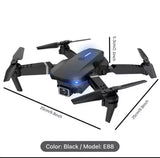 Black quadcopter drone with HD camera and four propellers