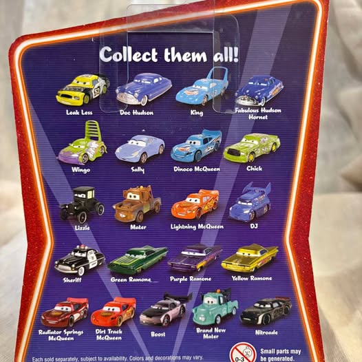 Diecast car collectible display card with colorful cars and 0-3 label