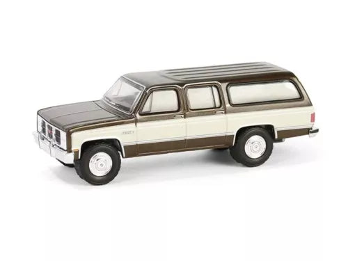 Beige and dark-roof diecast 1986 SUV model, side view with wheels