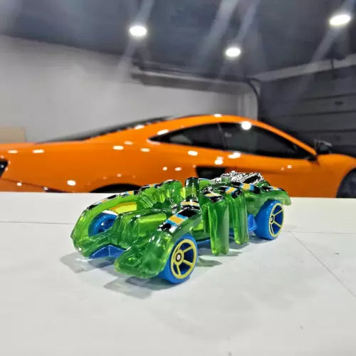 Hot Wheels Speed Spider diecast cars, green with blue wheels