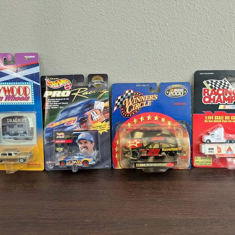 NASCAR diecast car lot in blister packaging, multiple racing cars
