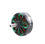 FPV brushless motor with green and copper stator fins and silver mounting shaft