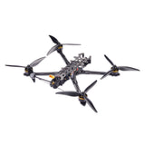 Quadcopter FPV drone with four black propellers and gray frame